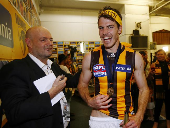 Issac Smith &amp; Mark Robinson after the 2015 grand final. Picture: Wayne Ludbey