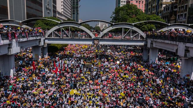 Thousands protest against the coup at Yangon’s Sule Square on Wednesday. Picture: Getty Images