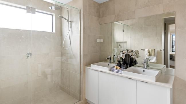 The ensuite bathroom has a in-situ shower and dual vanity.