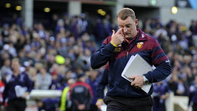 Lions champion Michael Voss leaves the field as Brisbane coach after a loss in Perth.