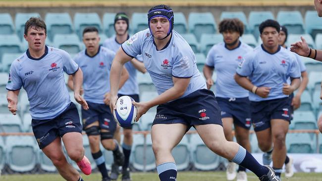 Oliver Smith for Waratahs during their big round one win. Picture: John Appleyard.