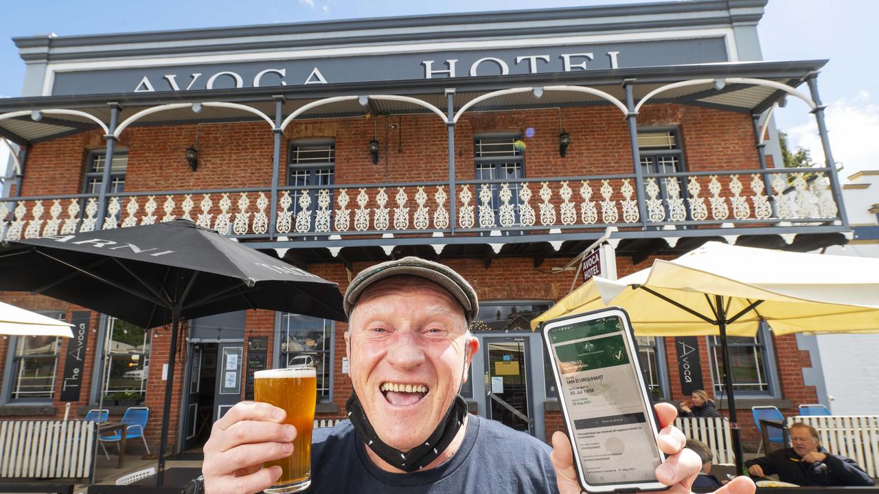 Publican Ian Urquhart shows his double vaccination status at the Avoca Hotel which is part of the state government's ‘vaccine economy’ trial. Picture: Rob Leeson