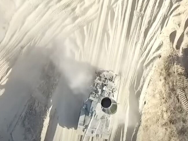 Vision of a grenade being dropped on an Israeli tank