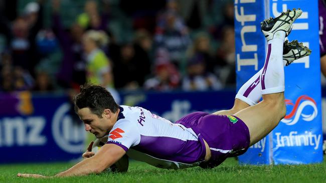 Cooper Cronk of the Storm scores a try during the Sydney Roosters v Melbourne Storm NRL round 14 game at Allianz Stadium, Sydney. pic Mark Evans