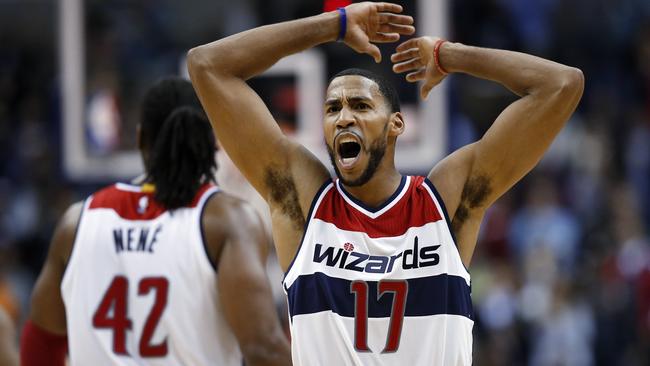 Washington Wizards guard Garrett Temple celebrates the overtime win.