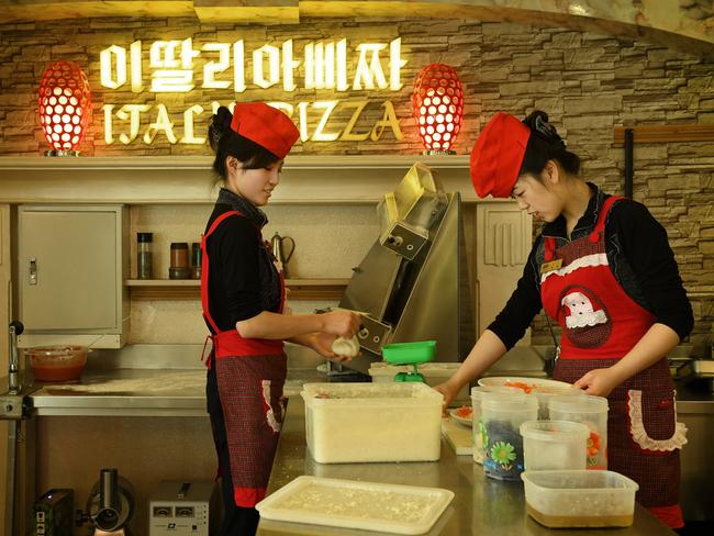 North Korean women make pizzas at upscale italian pizza restaurant on Mirae Scientists Street in Pyongyang. Picture: Linda Davidson/The Washington Post via Getty Images