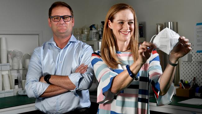 Detmold Group CEO Alf Ianniello and Director Sascha Detmold Cox with a high-grade medical mask they are about to start mass-producing in their factory. Picture: Tricia Watkinson