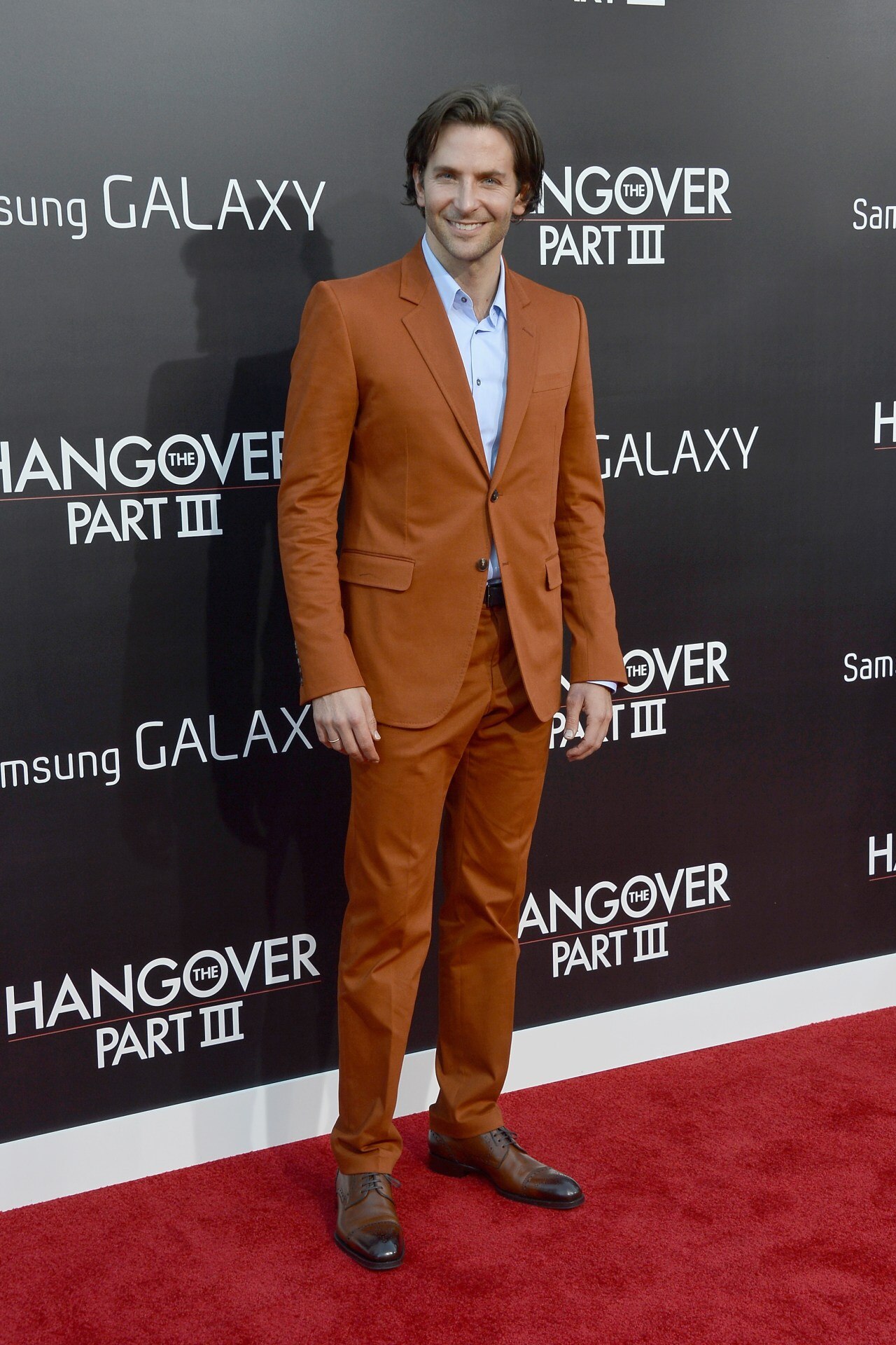 <h3>2013</h3><p>&nbsp;</p><p>Showing a broad love of suiting colours, here Cooper opts for one in a very autumnal shade of orange for the premiere of <em>Hangover Part 3</em>.</p>