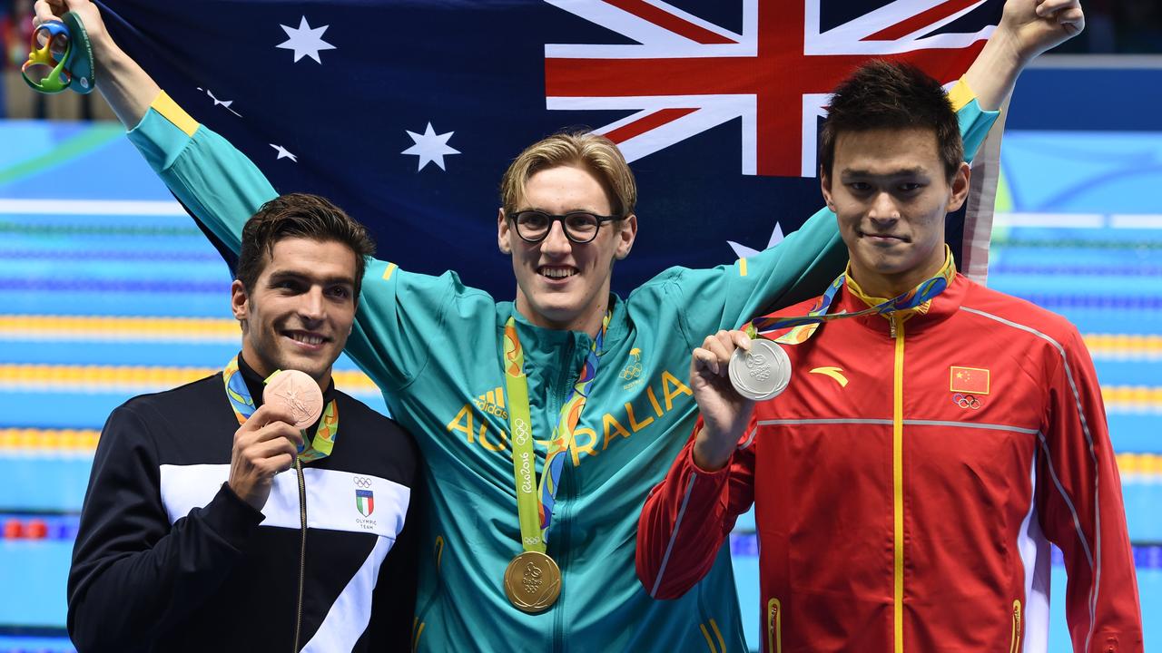 Horton (centre) celebrates his Rio Olympic gold medal with Sun Yang of China (right, silver) and Gabriele Detti of Italy (left, bronze). Picture: AAP Image/Dean Lewins