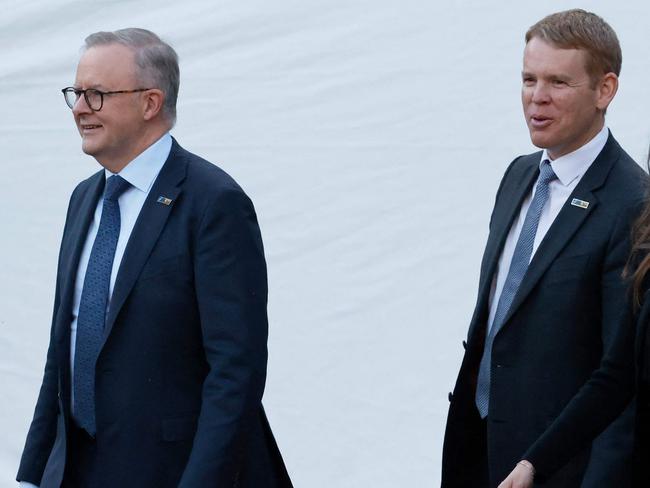 Australia's Prime Minister Anthony Albanese (L), New Zealand's Prime Minister Chris Hipkins and Iceland's Prime Minister Katrin Jakobsdottir walk ahead of the social dinner during the NATO summit, at the Presidential Palace in Vilnius on July 11, 2023. NATO leaders will grapple with Ukraine's membership ambitions at their summit on July 11, 2023, their determination to face down Russia boosted by a breakthrough in Sweden's bid to join the alliance. (Photo by Ludovic MARIN / POOL / AFP)