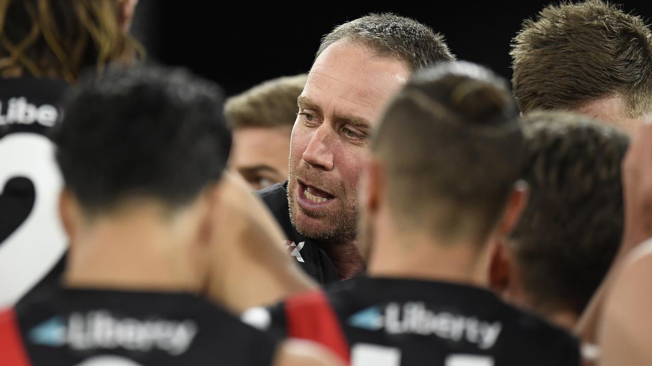 Bombers coach Ben Rutten speaks to his players during the loss to GWS. Picture: Albert Perez/AFL Photos