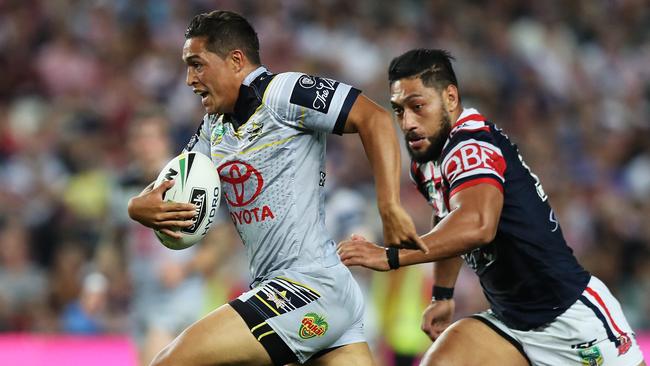 Te Maire Martin races away to score a try for the Cowboys. Picture: Brett Costello