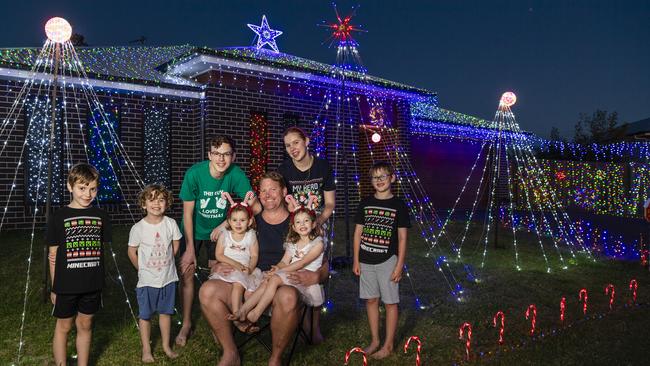 Christmas light display of the Rasmussen family of Wyreema (from left) Harvey, Finley, Zackary, Everly, Andrew, Ottilie, Eden and Alfie Rasmussen, Monday, December 13, 2021. Picture: Kevin Farmer