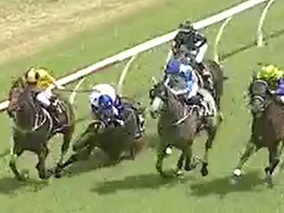 Three jockeys Emily Atkinson (So Super, white and blue silks), Luke Rolls (Cutting Loose, black and blue silks) and Tennille Gray (Baltic Cavalier, white silks) fell off their horses during race one at Clarence River Jockey Club in Grafton on Monday, 29th March, 2021.