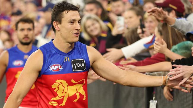 MELBOURNE, AUSTRALIA - APRIL 11: Hugh McCluggage of the Lions celebrates after the Lions defeated the Demons during the round five AFL match between Melbourne Demons and Brisbane Lions at Melbourne Cricket Ground, on April 11, 2024, in Melbourne, Australia. (Photo by Robert Cianflone/Getty Images)