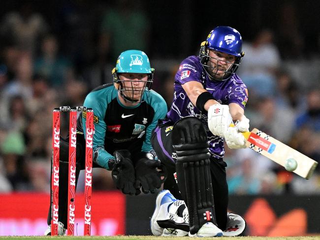 BRISBANE, AUSTRALIA - JANUARY 16: Caleb Jewell of the Hurricanes plays a shot during the BBL match between Brisbane Heat and Hobart Hurricanes at The Gabba, on January 16, 2025, in Brisbane, Australia. (Photo by Bradley Kanaris/Getty Images)