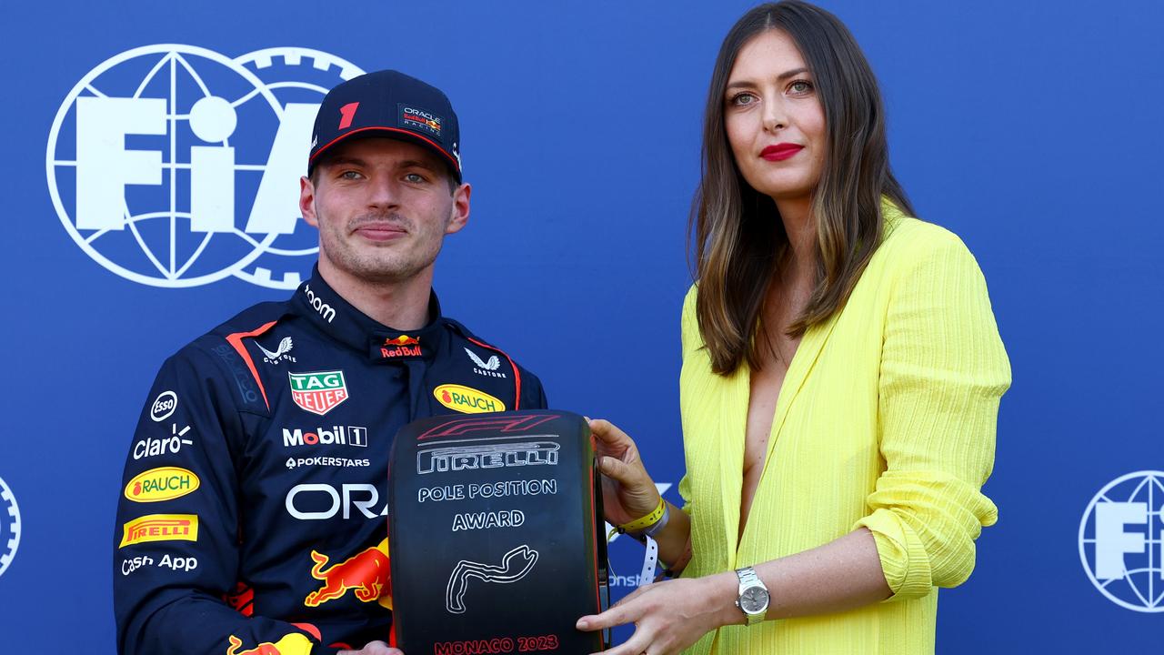 Max Verstappen is presented with the Pirelli Pole Position Award by Maria Sharapova. Photo by Mark Thompson/Getty Images.