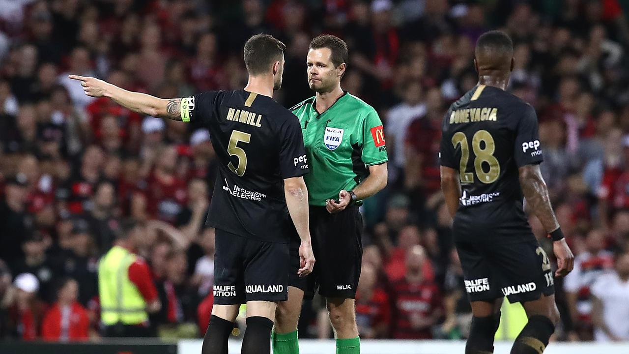 Brendan Hamill remonstrates with the referee after he overturned a VAR goal review.