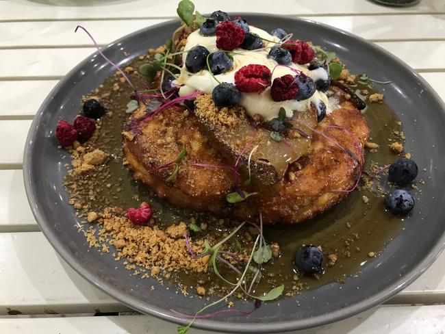 Ricotta hot cakes with berries, mascarpone, maple syrup and walnut crumb.