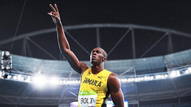 Usain Bolt waves to the crowd after winning the 200m final at the Rio 2016 Olympic Games. Picture: Phil Hillyard