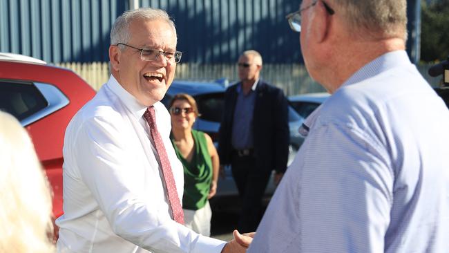 Former Prime Minister Scott Morrison with Federal MP Warren Entsch in Cairns after announcing a $60 million commitment for the Cairns University Hospital. Picture: Brendan Radke