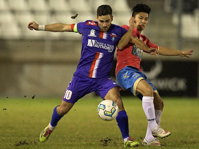 SYDNEY, AUSTRALIA - AUGUST 03: Brendan Cholakian of Manly and Martin Lo of the White Eagles contest the ball during the FFA Cup round of 32 match between the Bonnyrigg White Eagles and Manly United at Bonnyrigg Sports Ground on August 3, 2016 in Sydney, Australia. (Photo by Brett Hemmings/Getty Images)