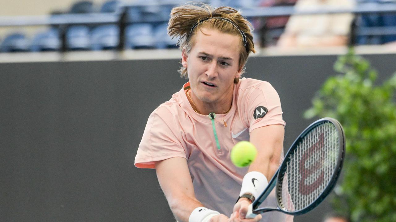 American tennis player Sebastian Korda hits a return during his semi-final match against Japan's Yoshihito Nishioka. (Photo by Brenton EDWARDS / AFP)