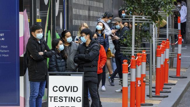 People queue for Covid testing in Bourke St in the CBD. Picture: NCA NewsWire / David Geraghty