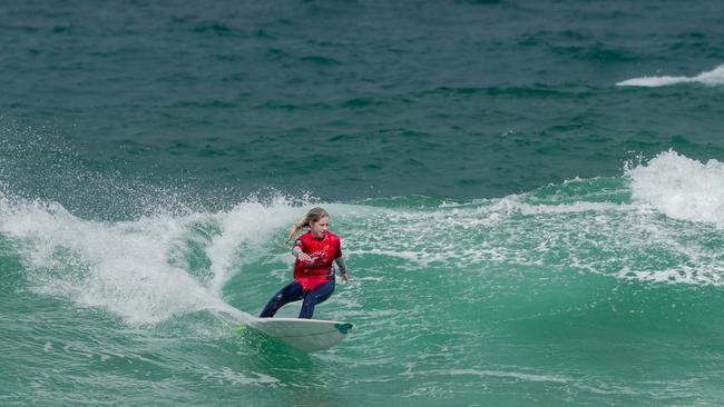 Sarah Seuren loves surfing alongside her twin sister Sonia and said she was lucky to get a sister and a surfing buddy when their parents pushed them into some waves at four years old. Credit: Surfing Victoria / Surfing Patrol