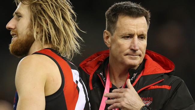 A shell-shocked Essendon coach John Worsfold with his captain Dyson Heppell. Picture: Michael Klein