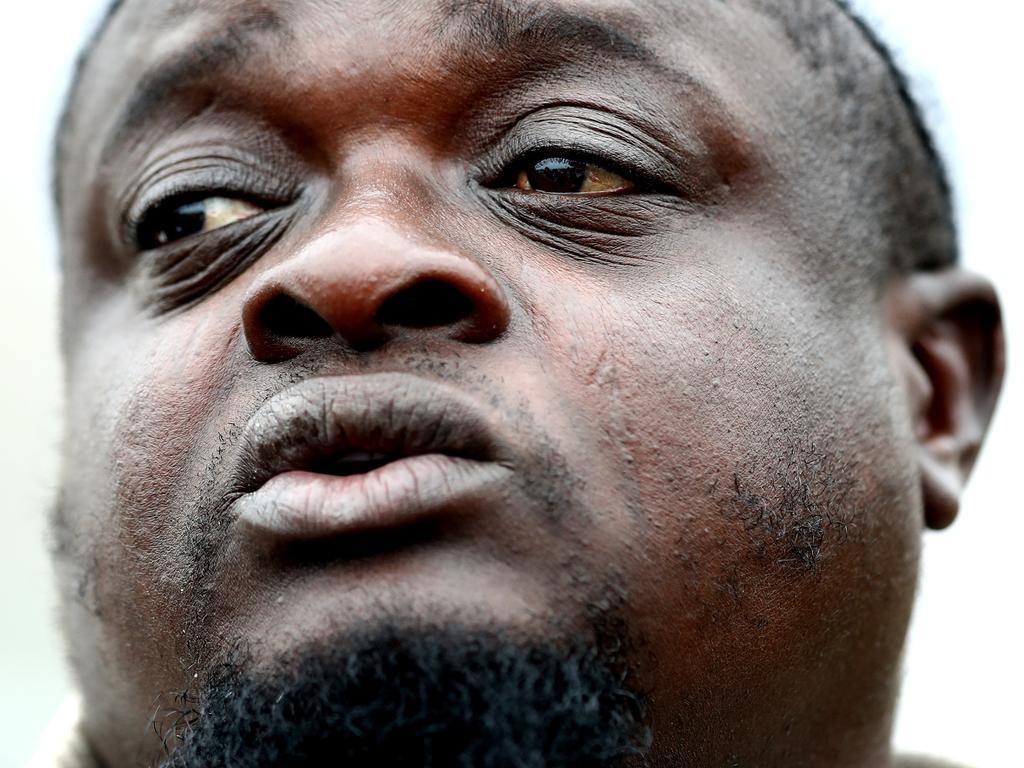 Alabi Lateef, a member of the Linwood mosque, tried to warn worshippers. Picture: AFP