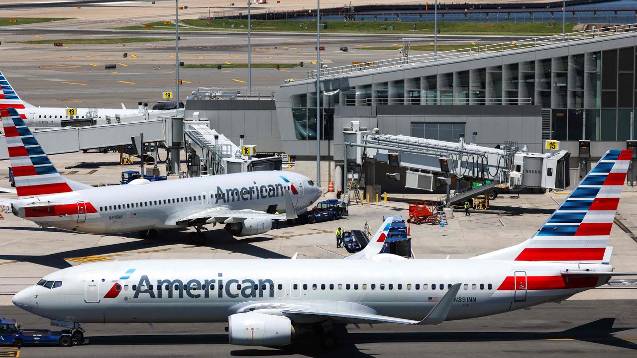 (FILES) American Airlines' Boeing 737 planes are seen parked at LaGuardia Airport in Queens, New York on May 24, 2024. (Photo by Charley TRIBALLEAU / AFP)