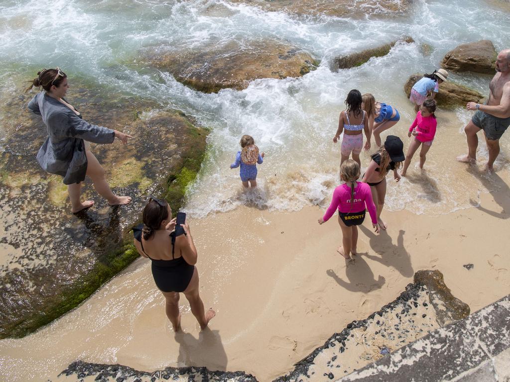 Beachgoers are urged to consider their surroundings. Picture: NewsWire / Simon Bullard.