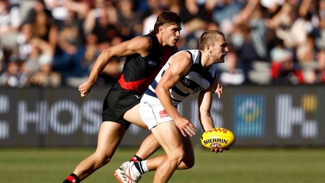 Tom Atkins in action against the Bombers. Picture: Michael Willson/AFL Photos via Getty Images