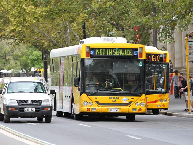 Public transport - Adelaide Metro bus during a ''dead running'' or Ghost run through King William Street, Adelaide. Buses running with a 'not in service' sign are usually travelling between routes.