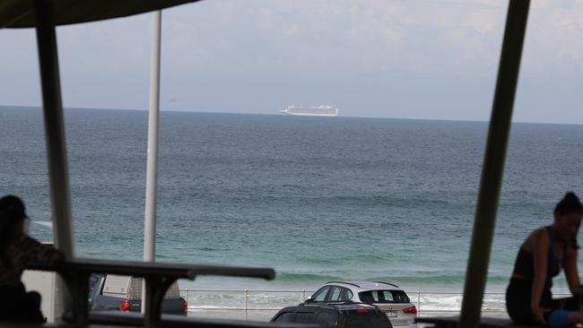 The COVID-19 infested Ruby Princess sits off Bondi on Thursday. Picture: John Grainger