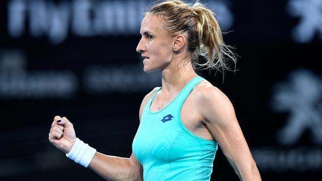 Lesia Tsurenko celebrates her victory over Ash Barty.