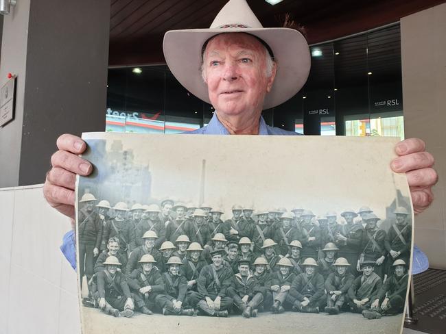 HONOUR: Vietnam veteran Ray Hiddlestone with a photograph of WW1 troops from his father's war album that he is donating to Gympie RSL. Photo: Frances Klein