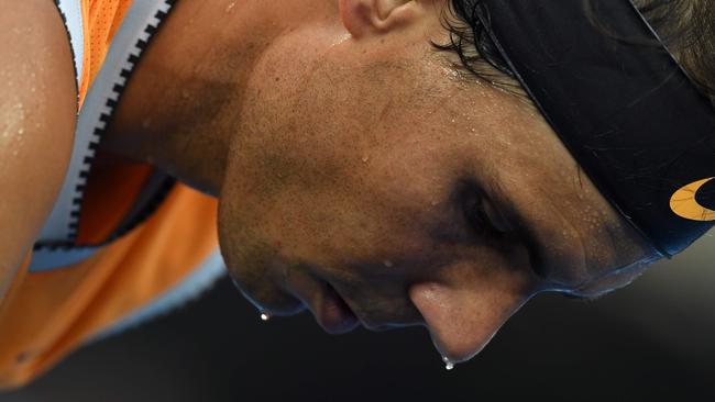 Spain's Rafael Nadal melts in the face of an almost flawless Novak Djokovic. Picture: Greg Wood/AFP