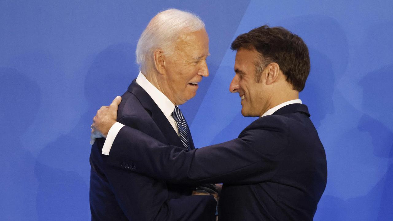 French President Emmanuel Macron and US President Joe Biden embrace at the NATO summit in Washington. Picture: AFP