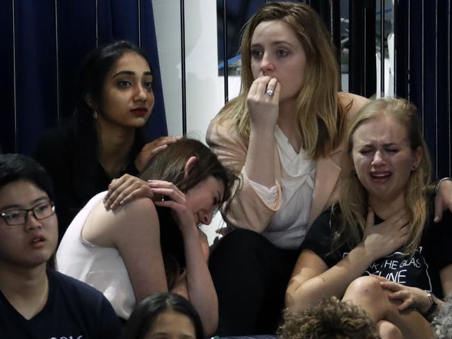 A group of girls reflect the current mood among Clinton supporters at her election night rally. Picture: Patrick Semansky/AP