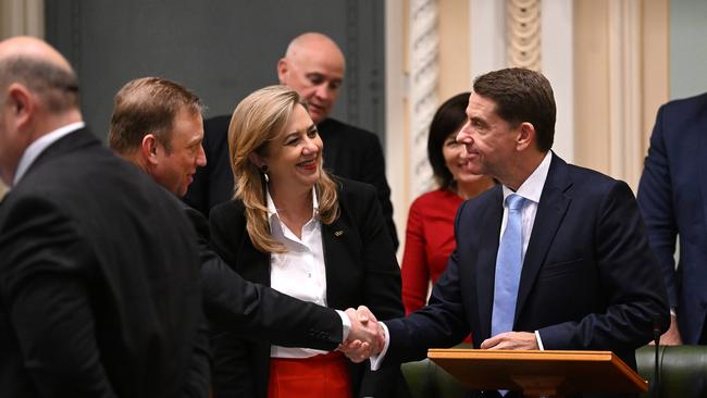 Queensland Premier Annastacia Palaszczuk, Deputy Premier Steven Miles and Treasurer Cameron Dick shake hands after Mr Dick handed down the 2022-23 state budget. Picture: NCA NewsWire / Dan Peled