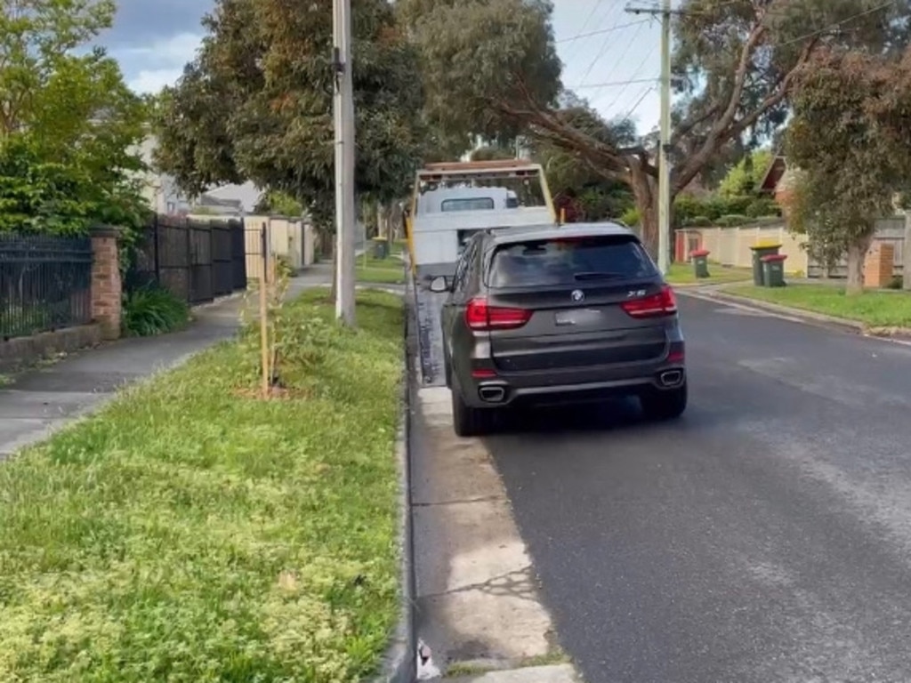 Several luxury cars were seized including a BMW X5.