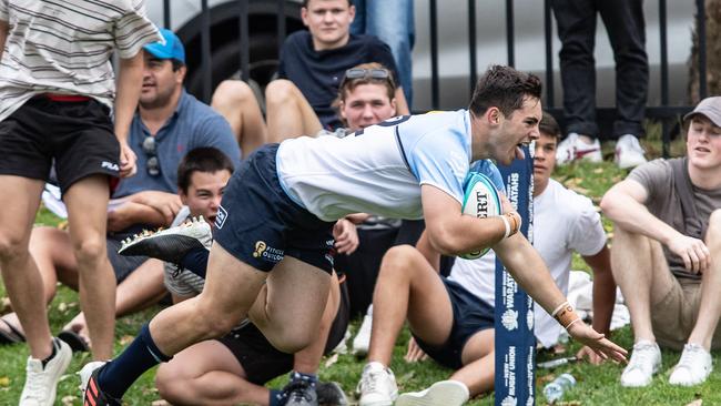 Zach Fittler scoring for the Waratahs U16s.