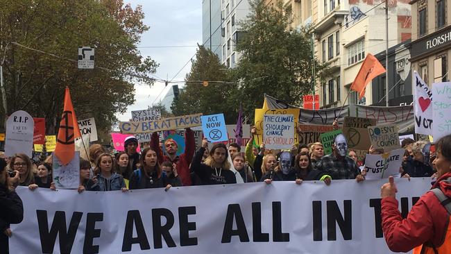 Protesters march through Melbourne. Picture: Remy Varga