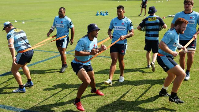 Karmichael Hunt training with former Origin teammate Israel Folau. Picture: Brett Costello