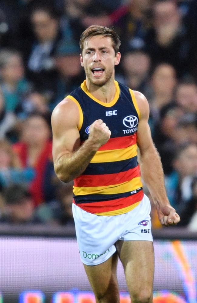 Richard Douglas celebrates a goal during Showdown 44. Picture: AAP Image/David Mariuz