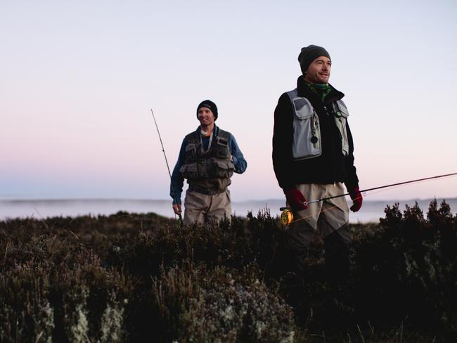 Fishers at Lake Burbury, a popular fishing lake on the edge of Tasmania's World Heritage Wilderness Area. Picture: Samuel Shelley