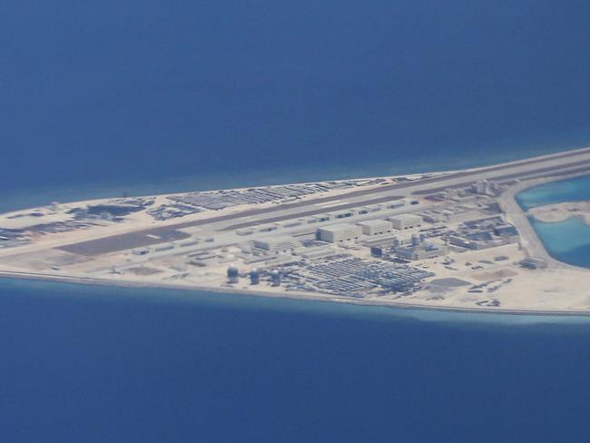 A photo released last month shows Chinese structures and an airstrip on the man-made Subi Reef at the Spratly group of islands in the South China Sea. Picture: Francis Malasig/AP