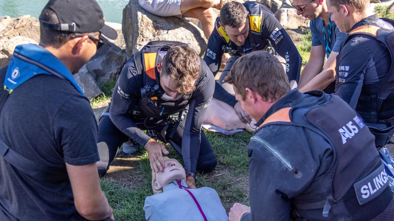 Jason Waterhouse, flight controller and tactician of Australia SailGP Team and skipper Tom Slingsby in safety training.